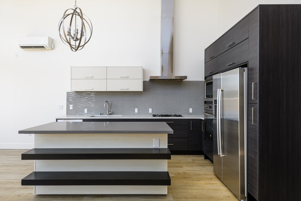 Bright modern kitchen at 16 Powerhouse Apartments in Sacramento, California