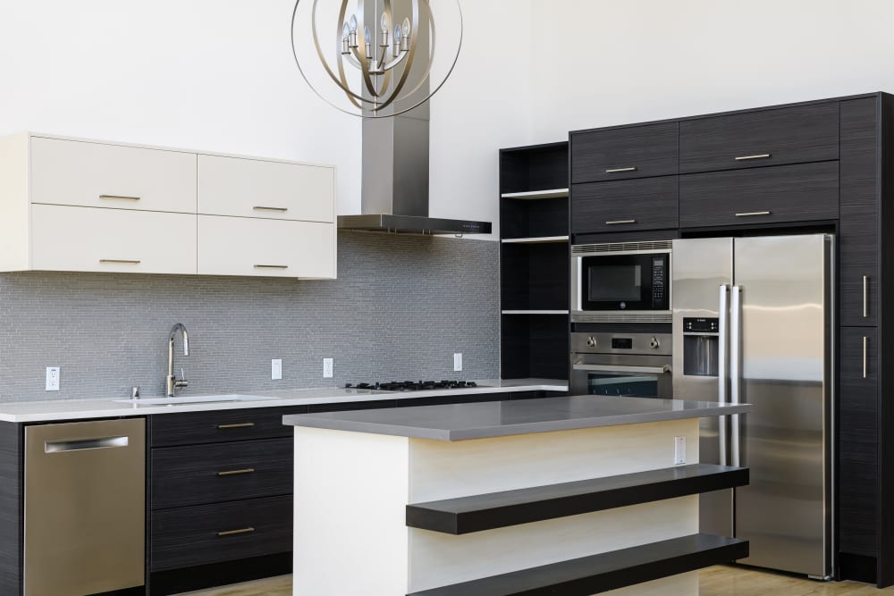 Beautiful modern model kitchen at 16 Powerhouse Apartments in Sacramento, California