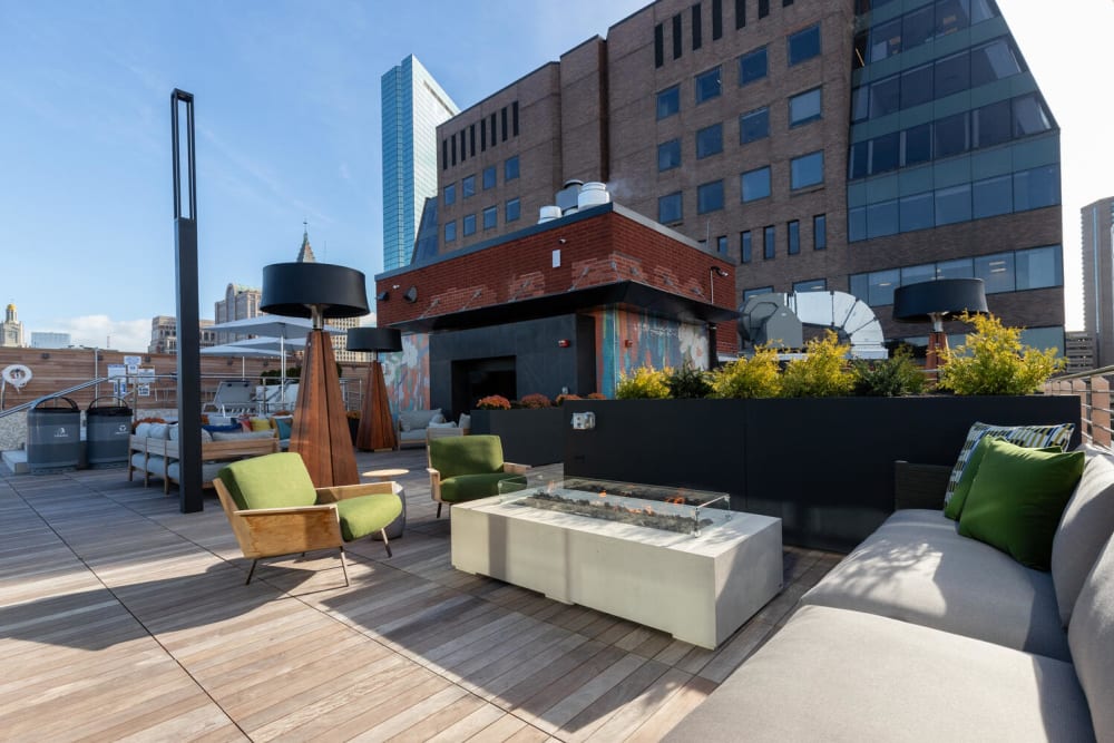 Firepits on the roof deck at 28 Exeter at Newbury in Boston, Massachusetts