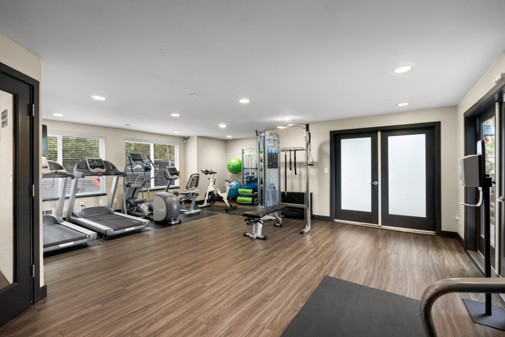 Clean, modern community gym at Karbon Apartments in Newcastle, Washington
