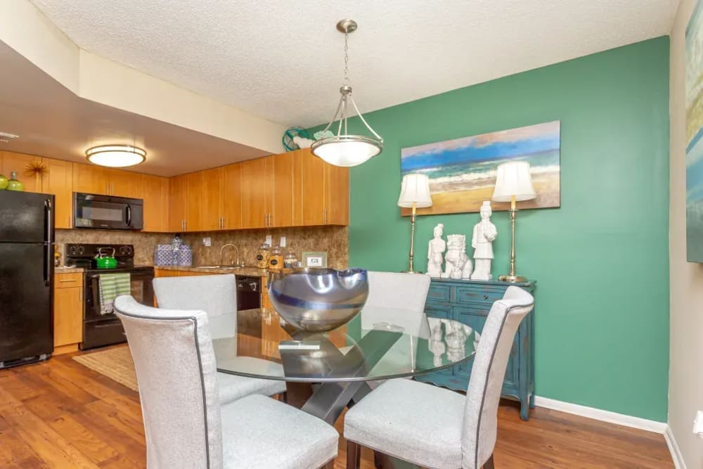 Wood flooring in an apartment dining room and kitchen at Fairway View in Hialeah, Florida