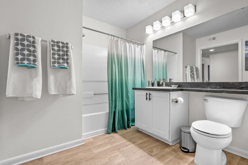 Bathroom with ample space at The Isle Apartments in Orlando, Florida