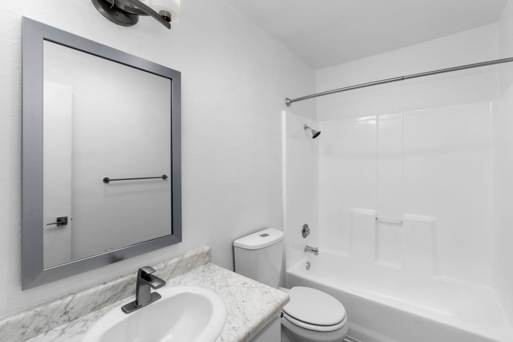Bathroom with a bathtub at Vista Apartments in Chula Vista, California