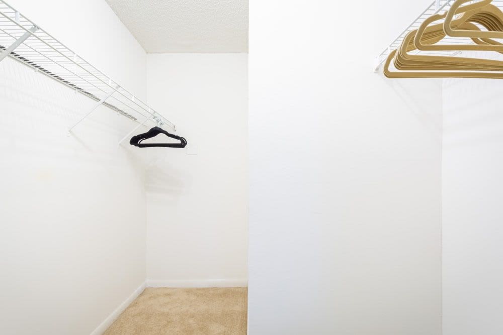 A walk-in closet in an apartment at Palmetto Place in Miami, Florida