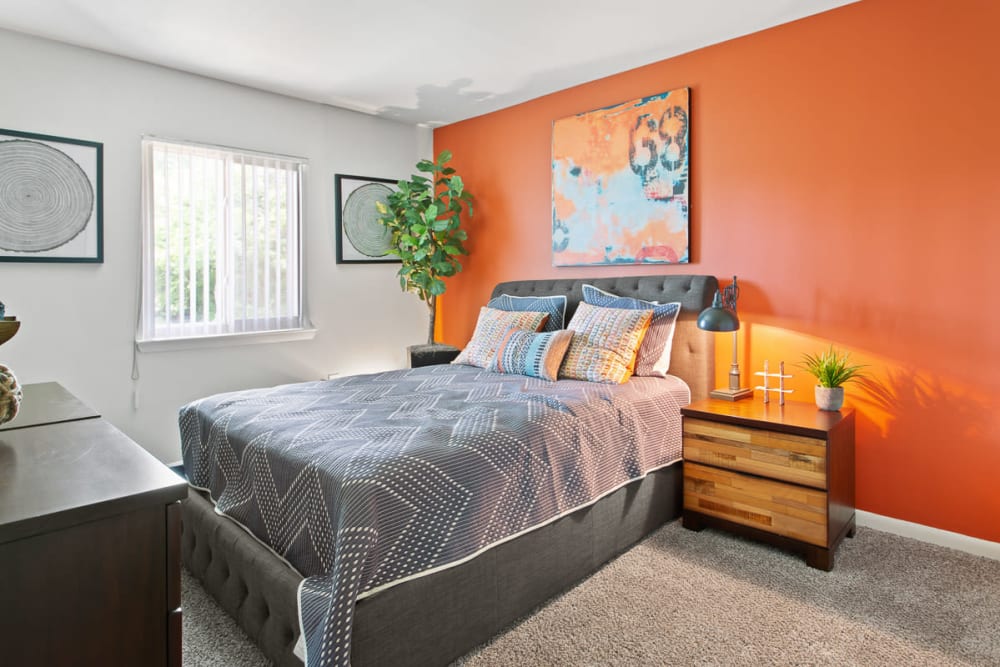 Orange bedroom at The Seasons Apartments in Laurel, Maryland