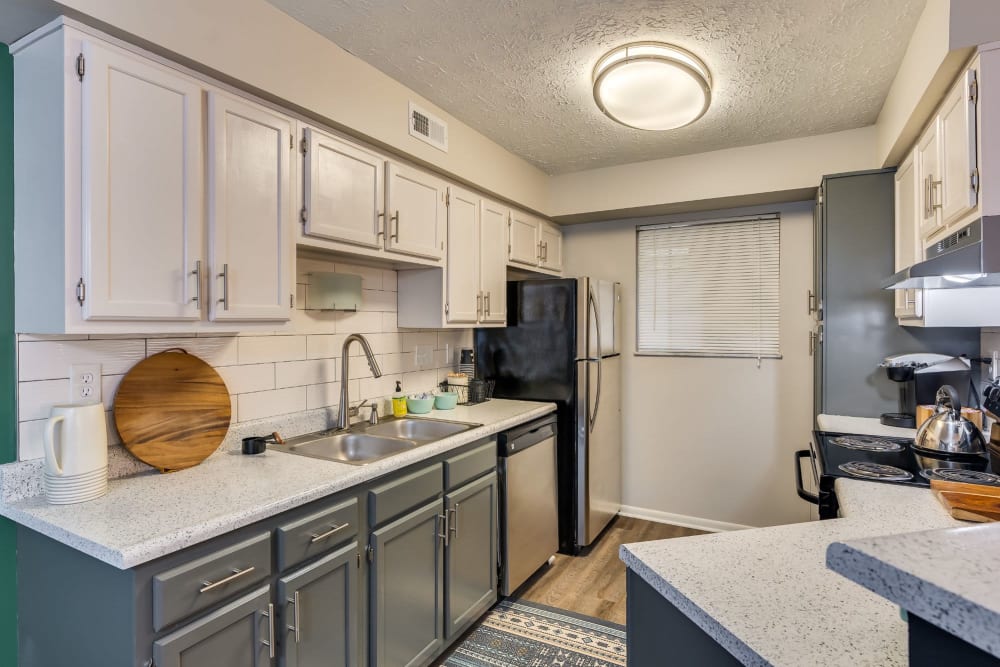 Kitchen with modern appliances at Villages of Wildwood in Fairfield, Ohio