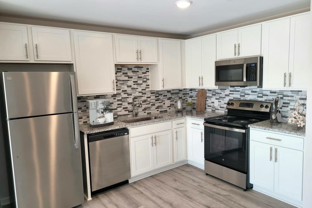 Beautiful modern kitchen with utilities included Hickory Creek Apartments & Townhomes in Nashville, Tennessee