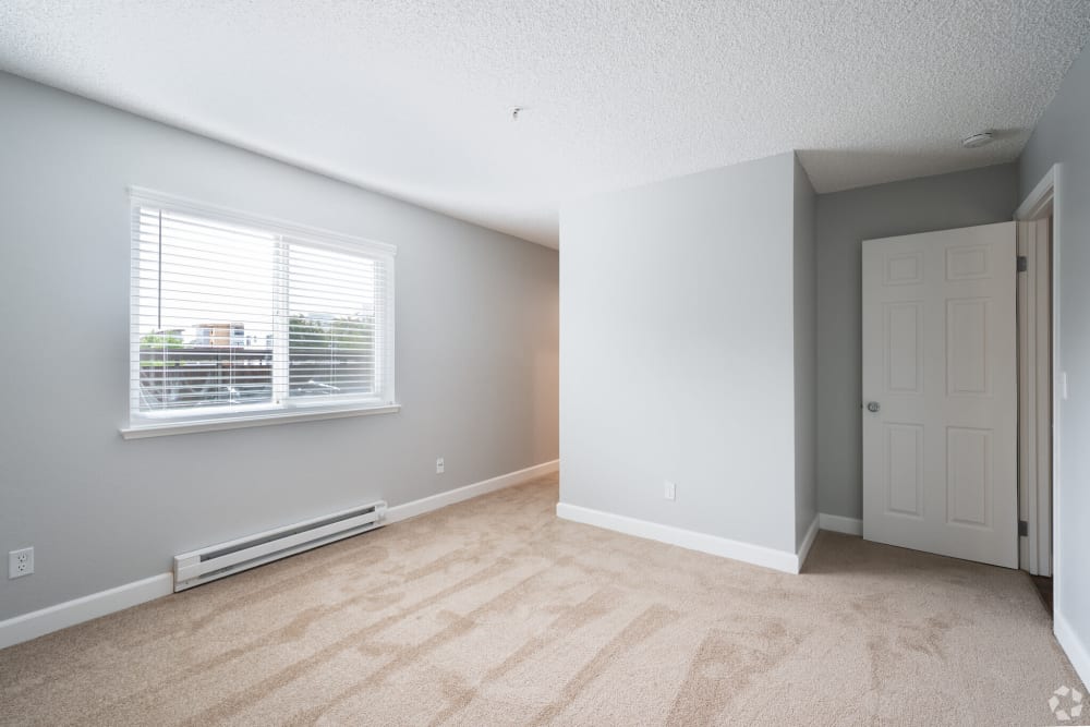 Model bedroom with soft carpet at Creekside Park Apartments in Napa, California