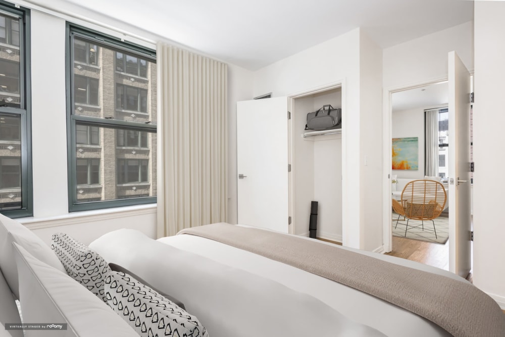 Apartment bedroom with closet at One India Street Apartments in Boston, Massachusetts