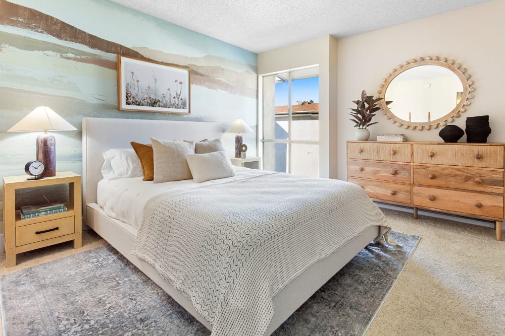 Large open bedroom with large amounts of natural light in a model home at The Villas at Woodland Hills in Woodland Hills, California 