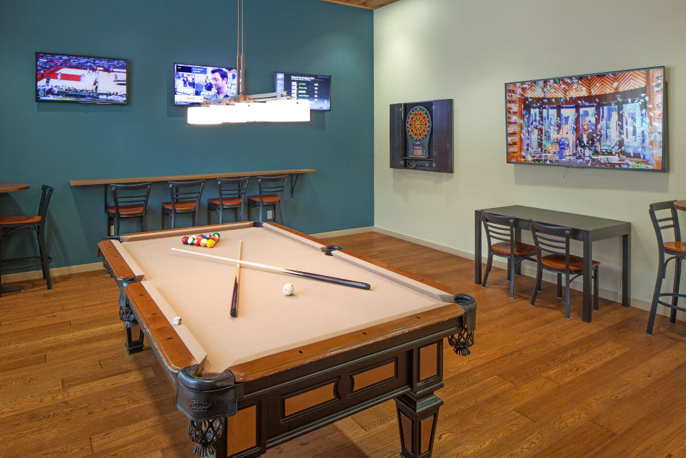 Large billiards room with a flat-screen TV at Eddyline at Bridgeport in Portland, Oregon