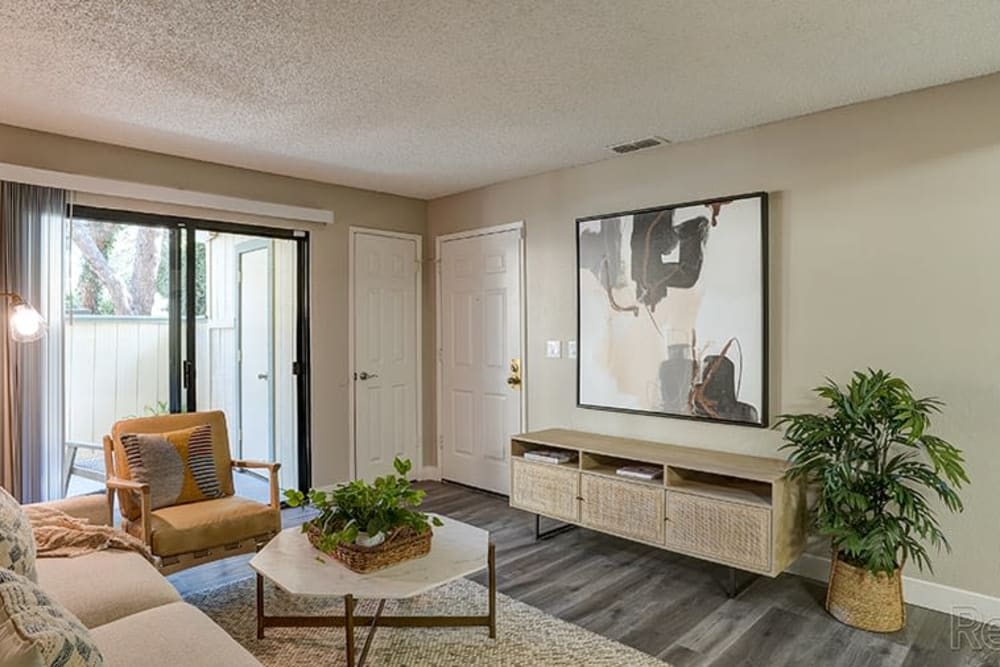 Elegantly decorated living room at Austin Commons Apartments in Hayward, California
