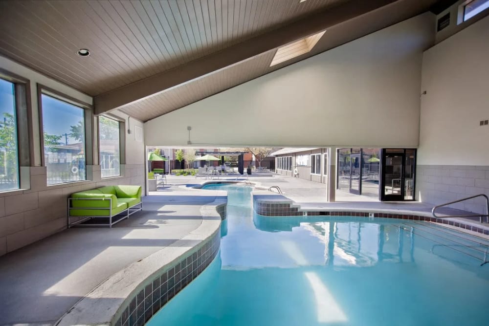 Indoor and outdoor swimming pool at Enclave at Redwood in West Valley City, Utah
