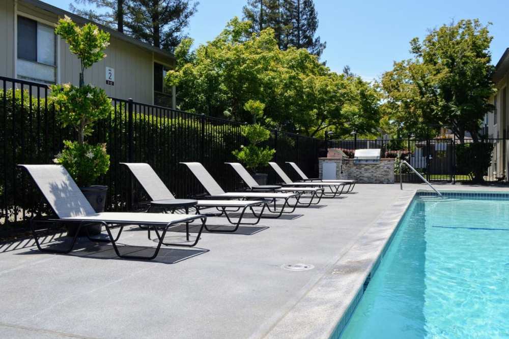 Deck chair around outdoor swimming pool at Bella Vista in Napa, California