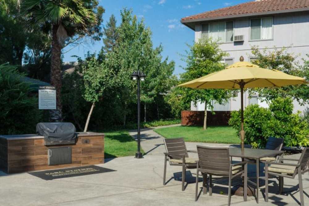 Grilling and picnic area on the well-landscaped grounds at Parc Station in Santa Rosa, California
