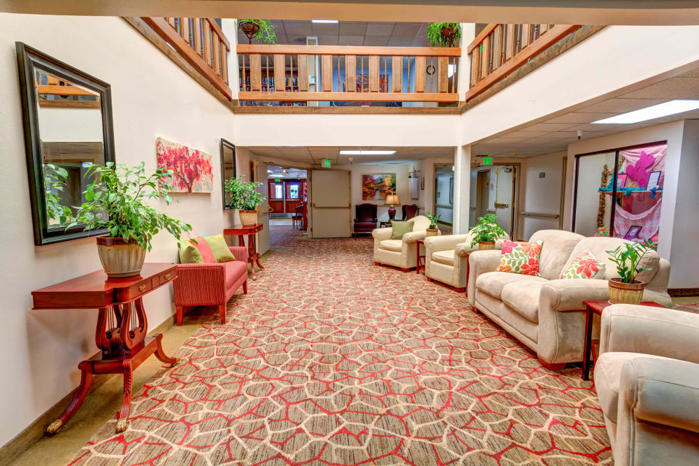 Lobby with high ceilings and comfortable seating at Junction City Retirement and Assisted Living in Junction City, Oregon