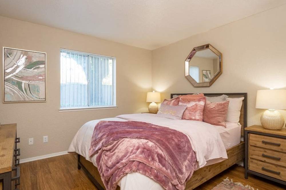 Peaceful master bedroom at Manchester Court in Modesto, California