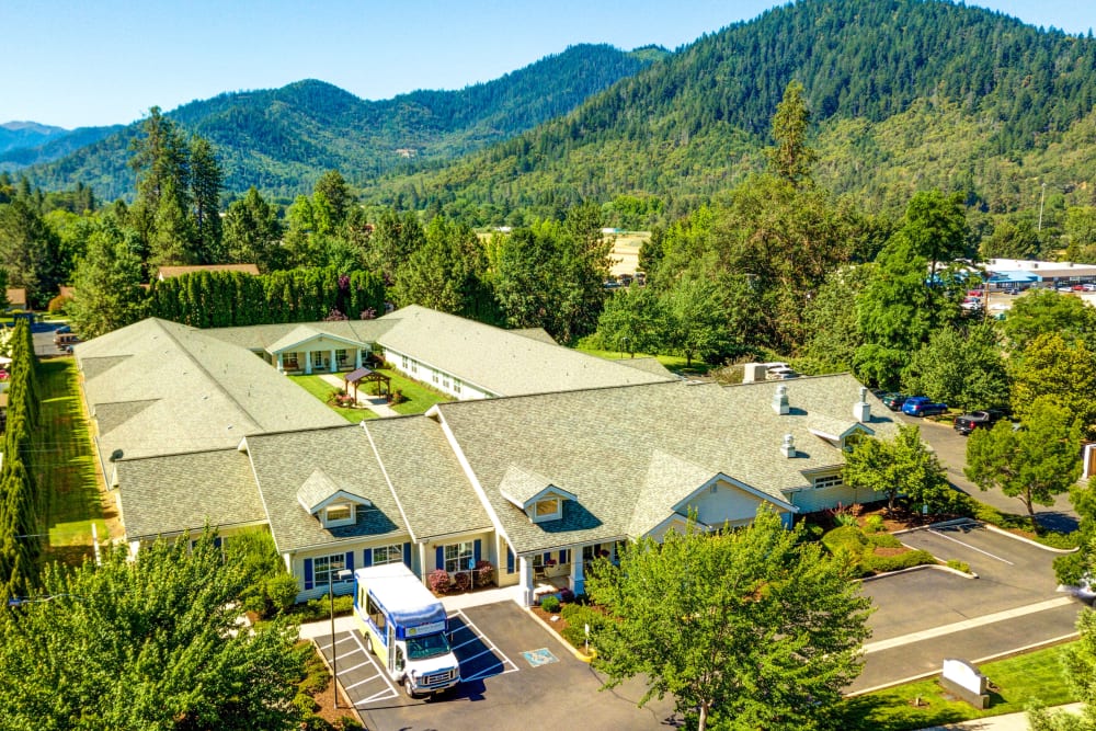 Aerial view of Morrow Heights Assisted Living and surrounding mountains in Rogue River, Oregon