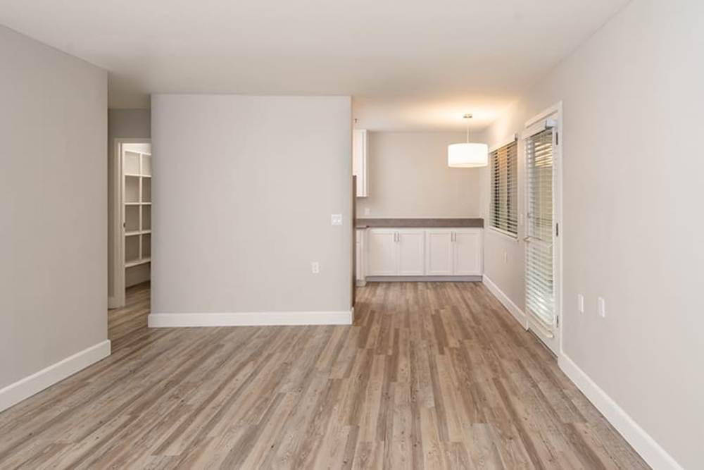 Model living room with hardwood floors at Ellinwood in Pleasant Hill, California
