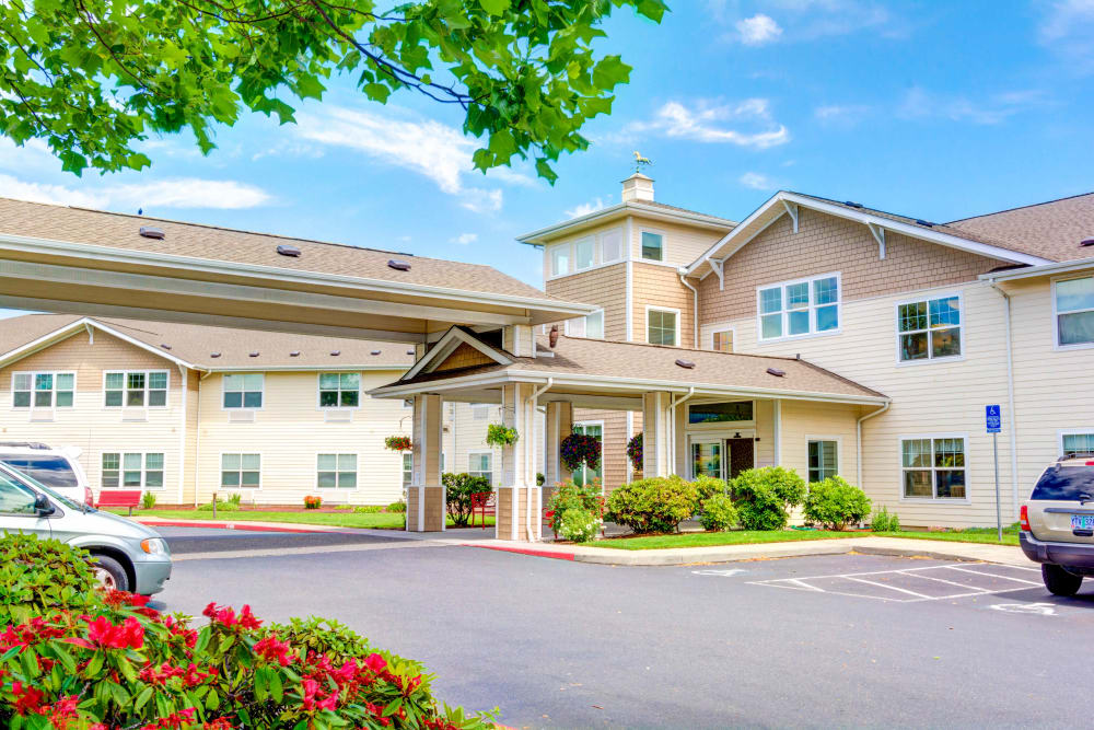 Street view of the main entrance and parking at Hawks Ridge Assisted Living in Hood River, Oregon