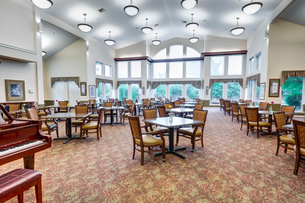 Dining room with cathedral ceilings at Hawks Ridge Assisted Living in Hood River, Oregon