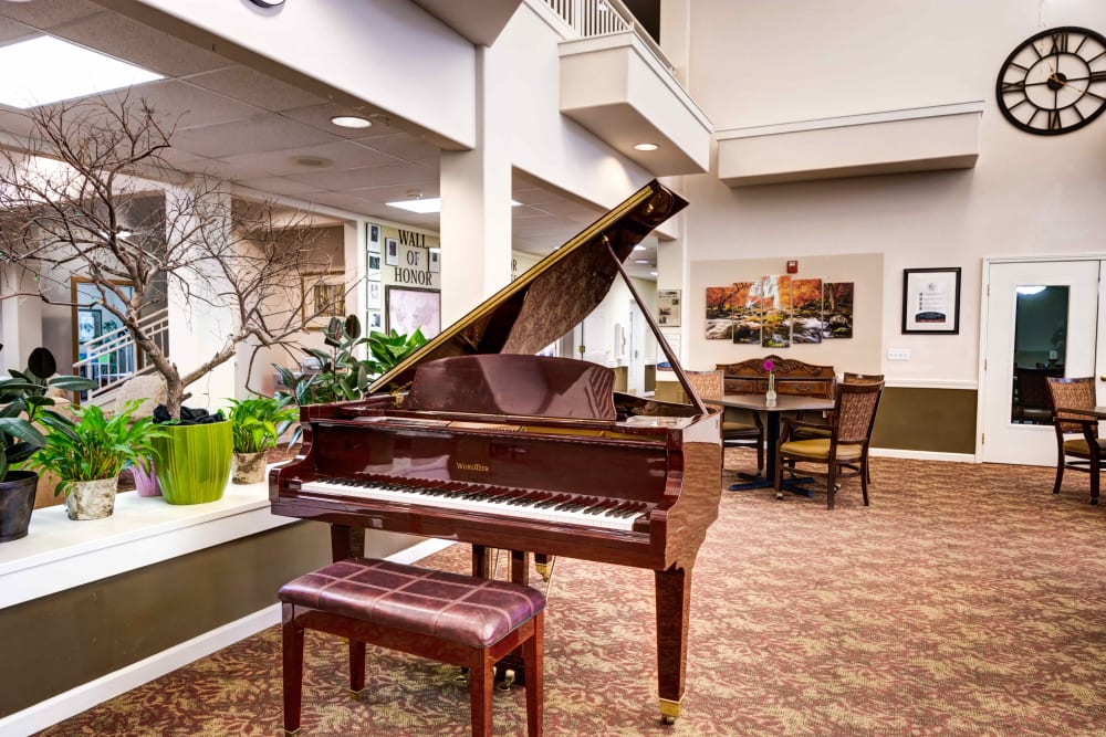 Grand piano near the dining room and resident lounge at Hawks Ridge Assisted Living in Hood River, Oregon