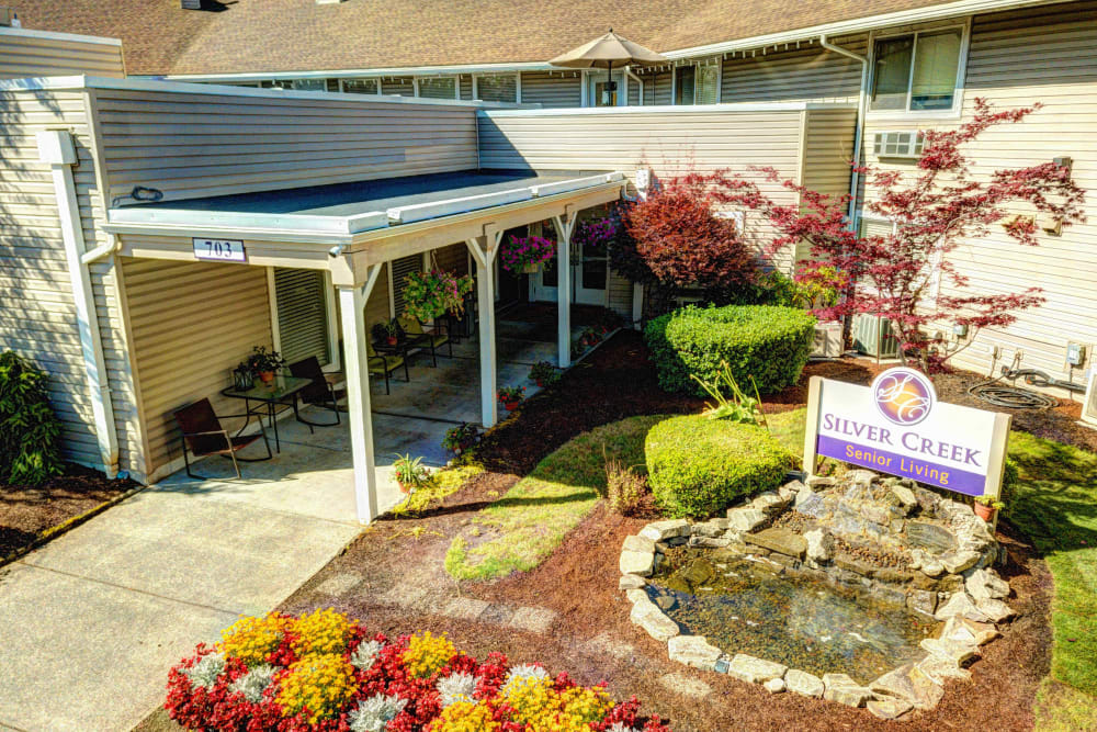 Aerial view of the main entrance and sing at Silver Creek Senior Living in Woodburn, Oregon