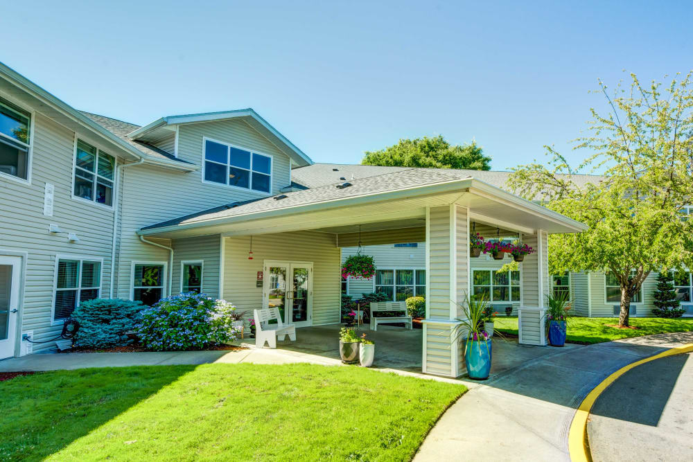 Exterior of the main entrance at The Suites Assisted Living and Memory Care in Grants Pass, Oregon