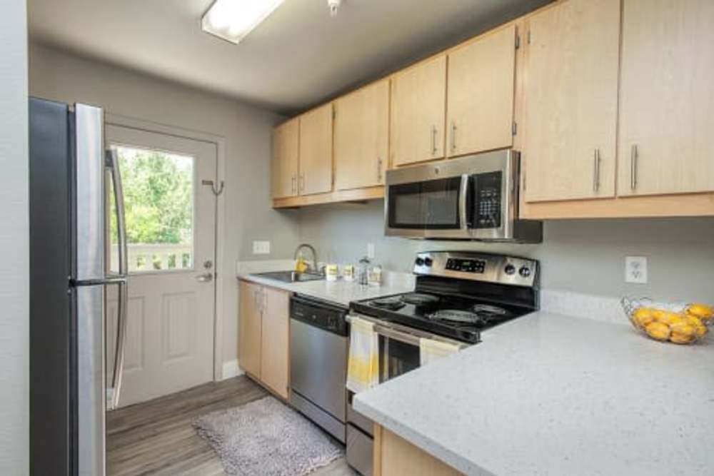 Fully equipped apartment kitchen at Octave in Davis, California