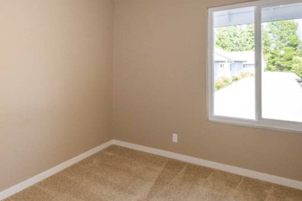  Bedroom space with soft carpet at The Meridian Apartment Homes in Walnut Creek, California