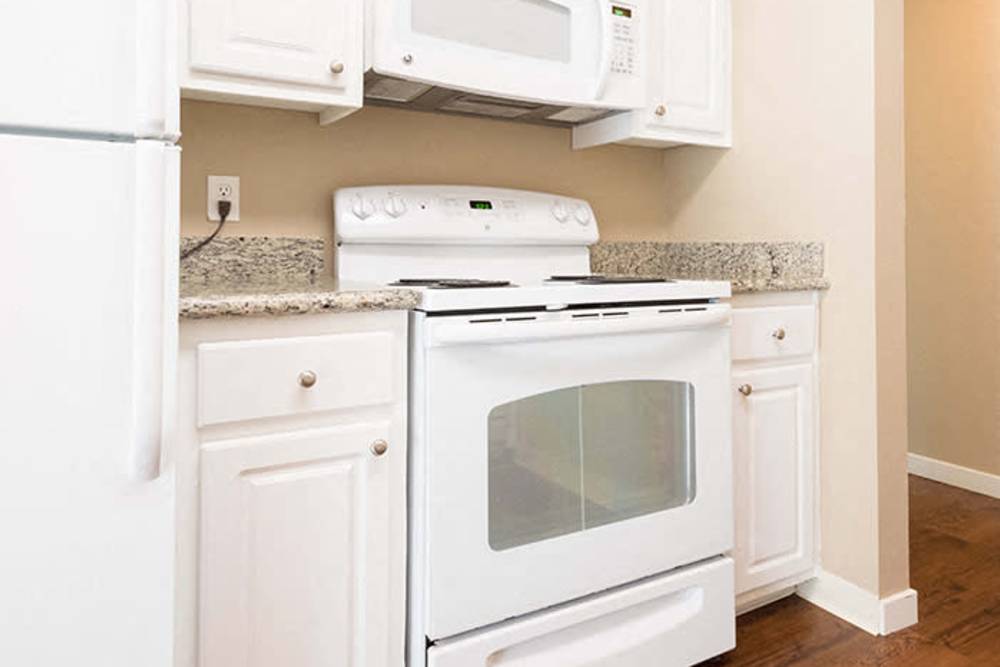 Kitchen with white appliance at The Meridian Apartment Homes in Walnut Creek, California