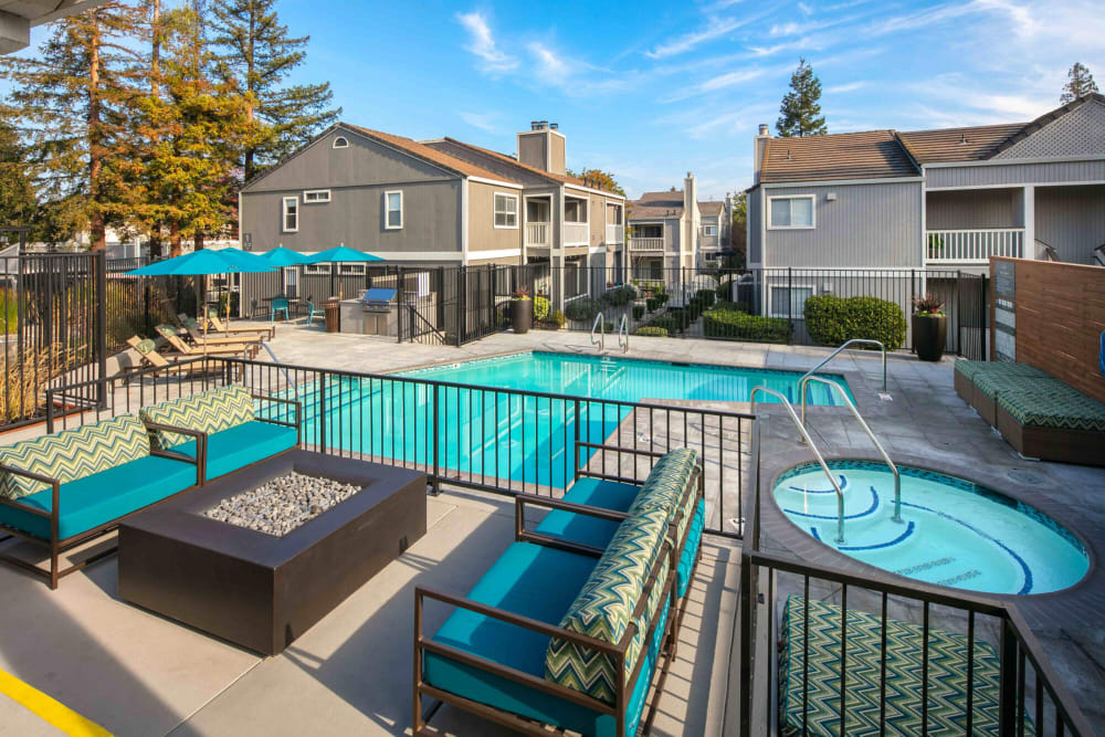 Outdoor fireplace poolside at The Hayden in Martinez, California