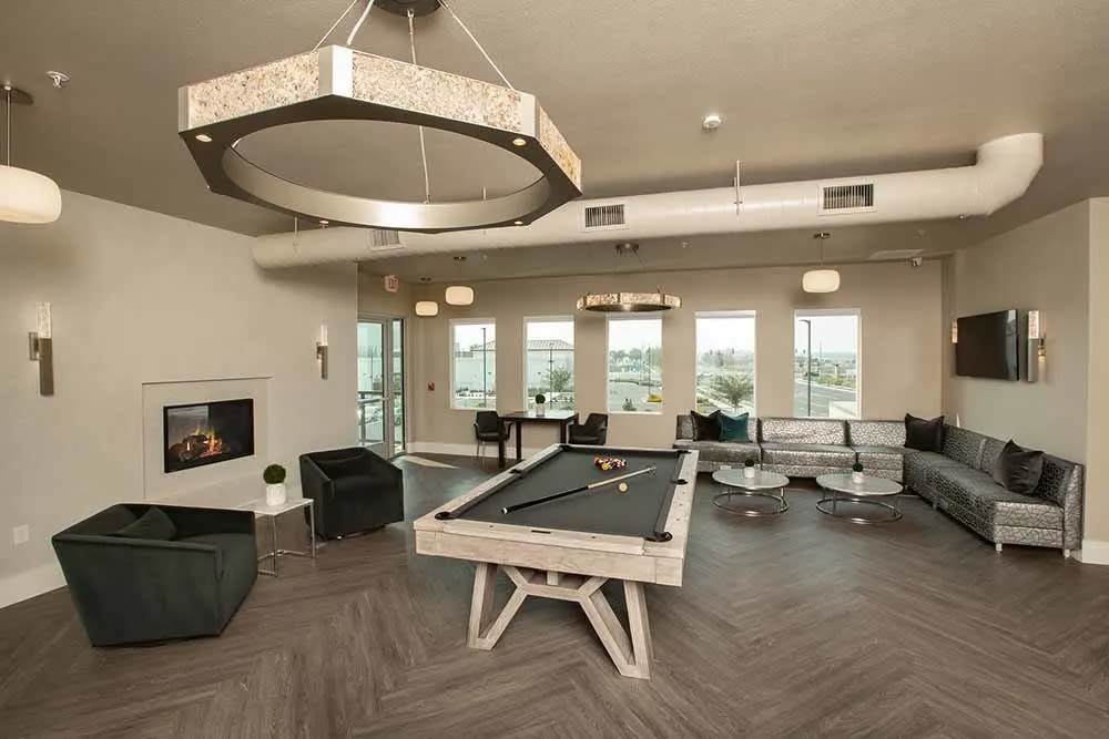 Pool table in clubhouse lounge at Allure Apartments in Modesto, California
