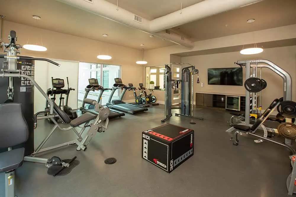 Gym with treadmill at Allure Apartments in Modesto, California