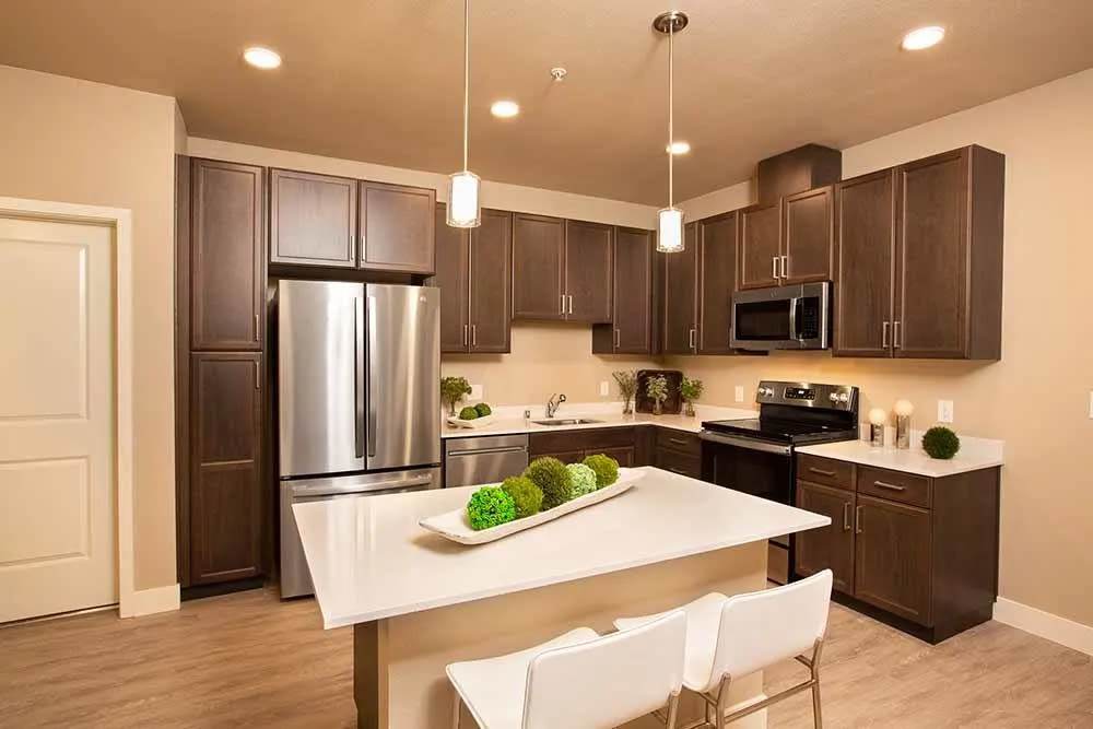 Kitchen with marble countertops at Allure Apartments in Modesto, California