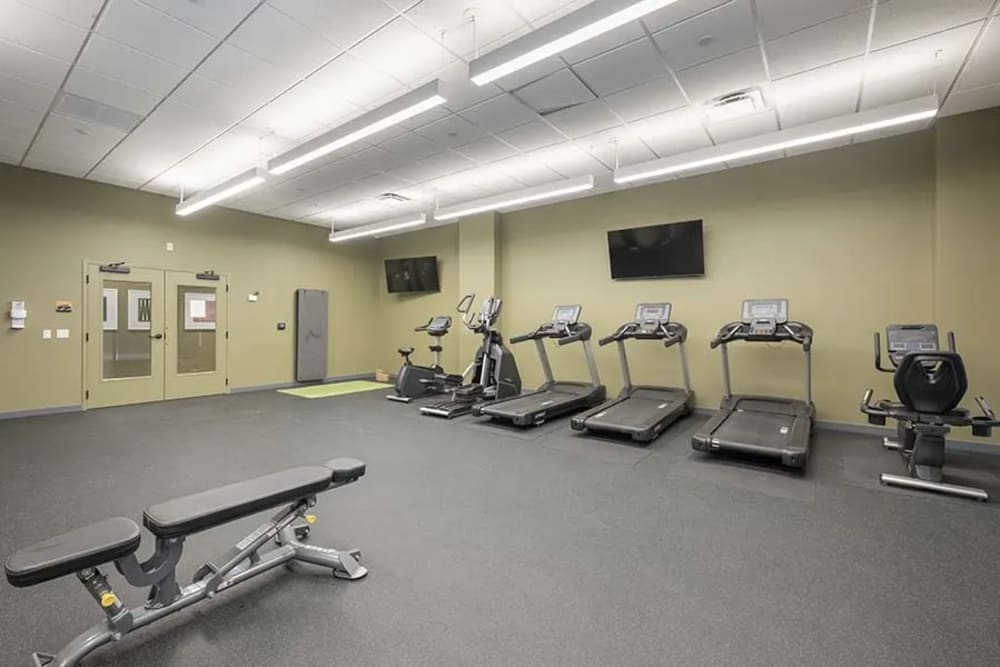 Well-equipped fitness center at Farmhouse Row by Vintage in Mill Creek, Washington