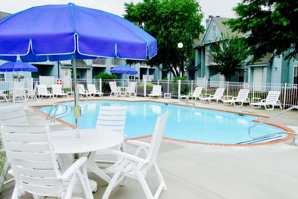 Seating around the community swimming pool at Royal Pointe in Virginia Beach, Virginia