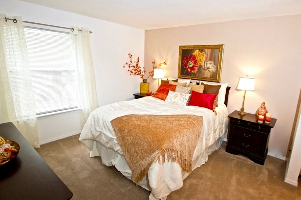 Plush carpeting in a furnished apartment bedroom at Royal Pointe in Virginia Beach, Virginia