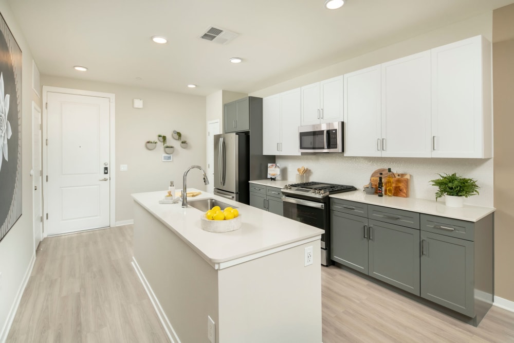 Kitchen with an island at Olympus Chandler at the Park in Chandler, Arizona