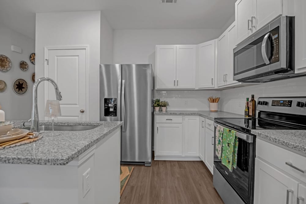 Beautiful white kitchen at The Artisan Living North Beach 