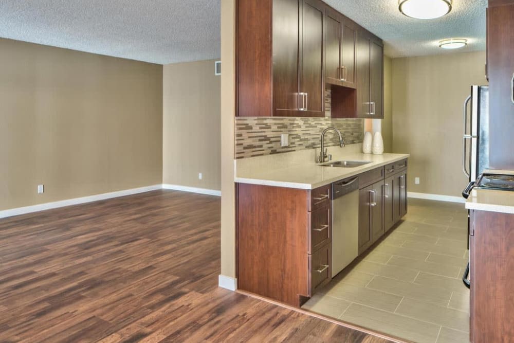 Kitchen with backsplash at The Astaire Apartments in Valley Village, California