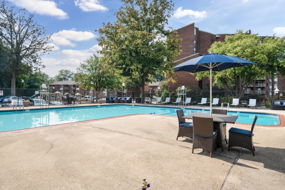 Swimming pool with chairs at Columbia Pointe in Columbia, Maryland