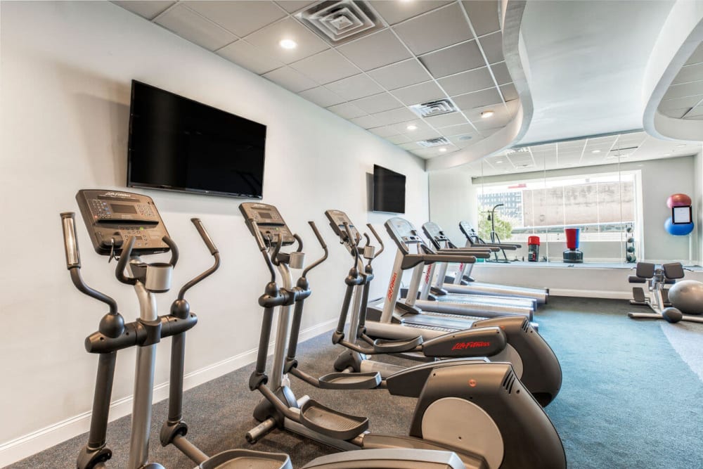 Fitness center with ellipticals at Residences at 1 Brown in Philadelphia, Pennsylvania