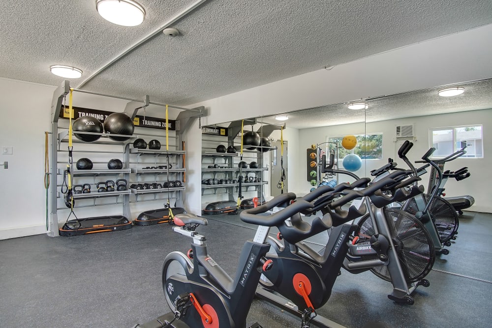 Fitness center with plenty of equipment at Marina's Edge Apartment Homes in Sparks, Nevada