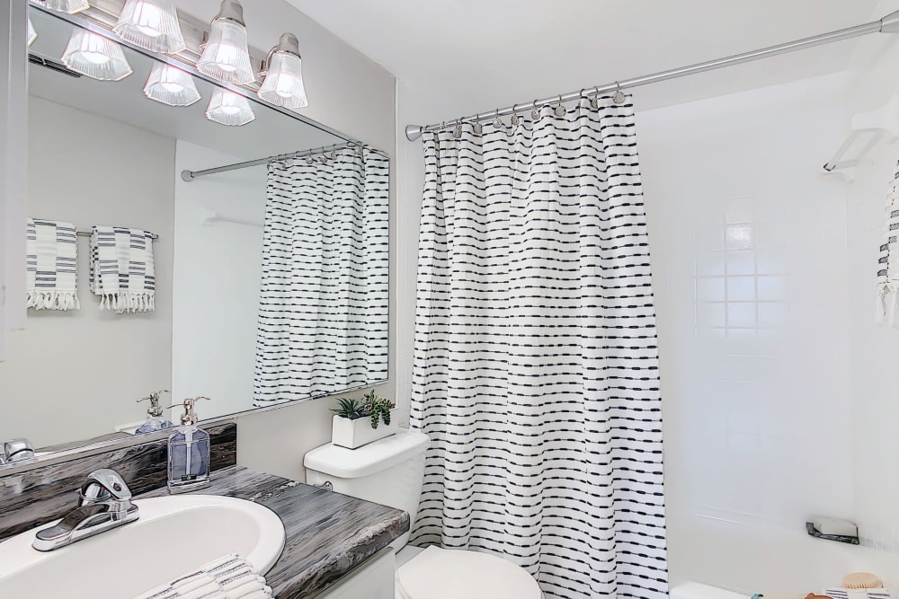 Bathroom with curtain at The Preserve at Spring Lake in Altamonte Springs, Florida
