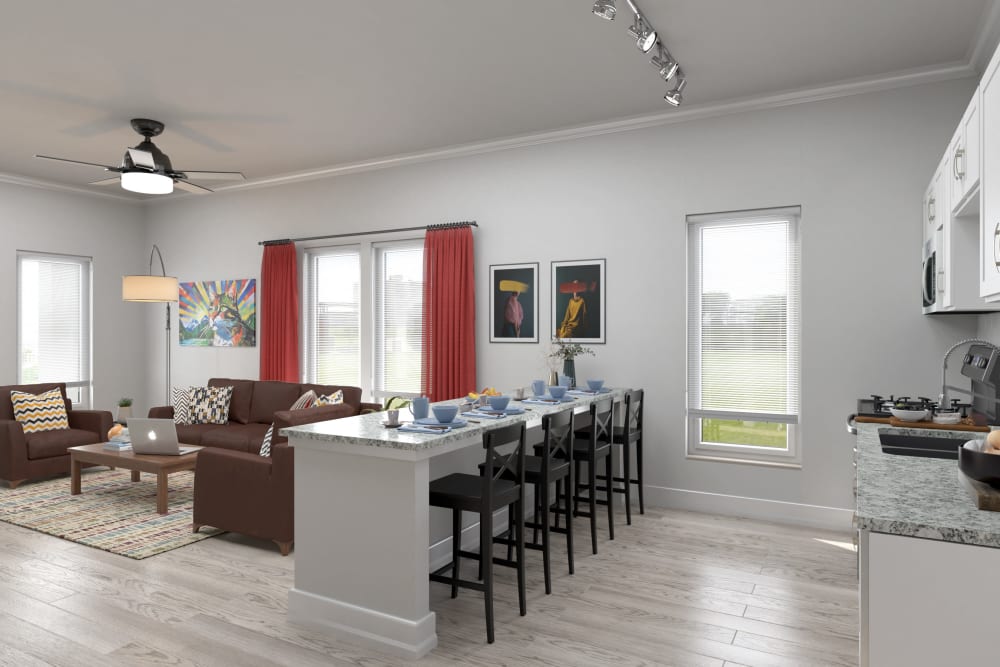 Model unit's living room and kitchen at West 22 in Kennesaw, Georgia
