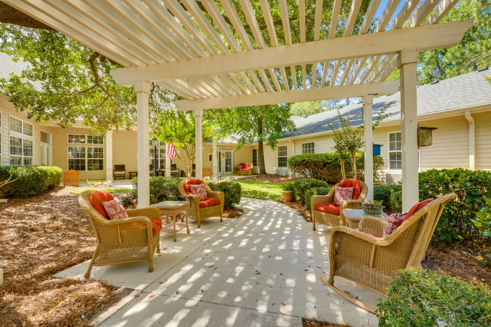 Comfortable outdoor chairs at Village Cove Assisted Living in Hilton Head Island, South Carolina