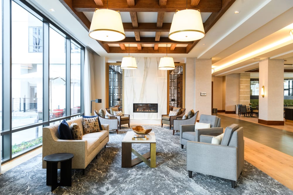 Resident lounge with fireplace at Clearwater at The Heights in Houston, Texas