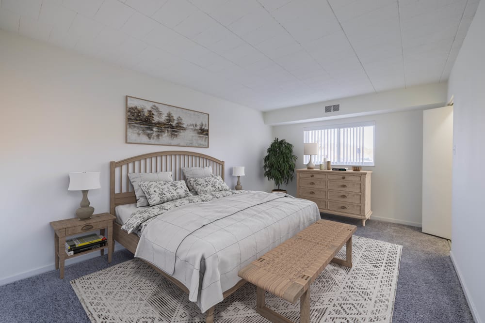 Cozy bedroom at The Avalon Apartment Homes in Avalon, Pennsylvania