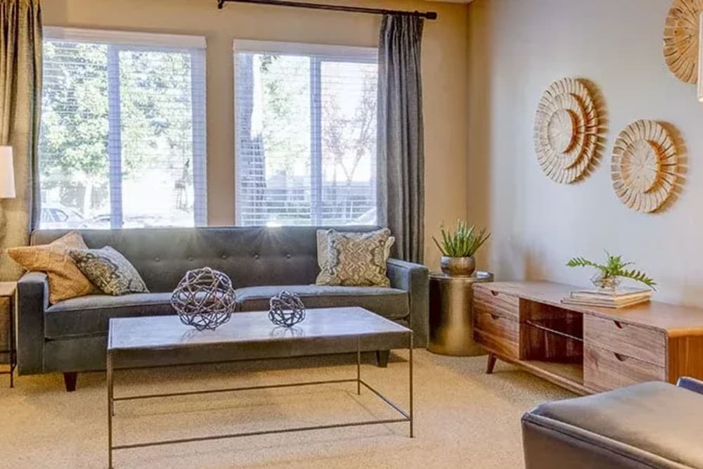 Cozy couch in a model home's living space at Las Ventanas in Pleasanton, California